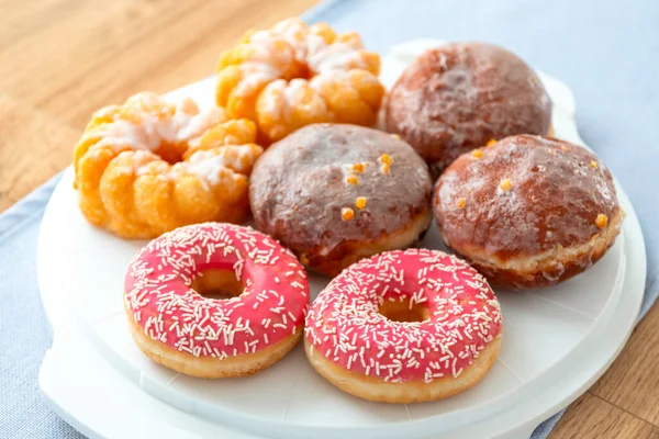 Set Donuts Plate Glazed Frosting Pink Icing Sprinkles — Stock Photo, Image