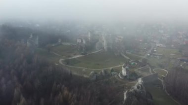 Ogrodzieniec Castle in the morning fog. Poland