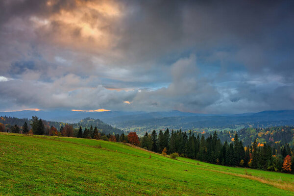Cloudy sunrise under the Tatra Mountains at autumn, Lapszanka. Poland