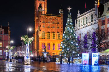 Gdansk, Poland - December 14, 2023: Christmas tree on the historic center of Gdansk at the Neptune Fountain, Poland.
