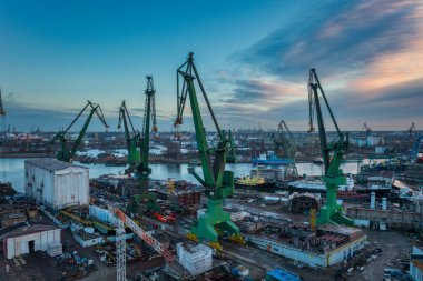 Gdansk, Poland - December 20, 2023: Shipyard areas in Gdansk at sunrise. Poland