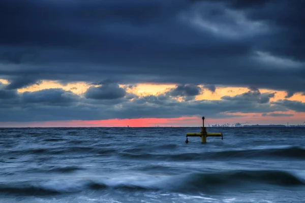 Winter landscape of Baltic Sea coast in Gdynia Orlowo at sunrise, Baltic Sea. Poland