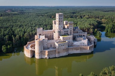 Beautiful landscape of Greater Poland forests and the newly built castle in Stobnica. Poland clipart