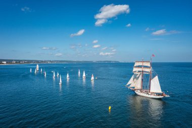 Baltic Sea scenery in Gdansk Brzezno at sailboats  parade, Poland. clipart