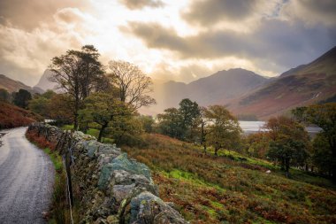 Beautiful autumn at the Buttermere lake in the Lake District National Park. England, UK clipart