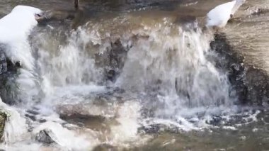 Spring thaw. Water rapids in the spring season when ice and snow melt.