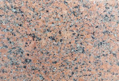 Doğal granit taş dokusu yakından. Tasarım çalışmalarınız için duvar ya da zemin olarak kullanılabilir.