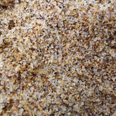 Macro shot of wet sand on a tropical beach