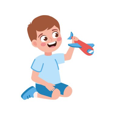 Küçük çocuk izole edilmiş oyuncak bir uçakla oynuyor.