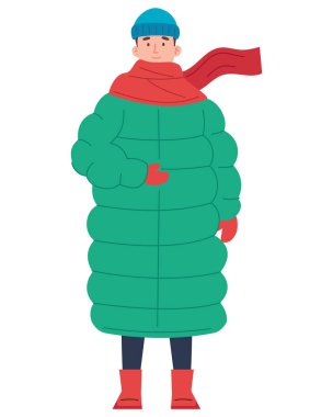 Yetişkin bir adam kışlık giysiler giyiyor.