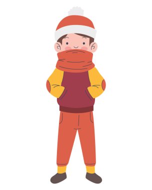 Kışlık giysiler giyen yakışıklı çocuk.