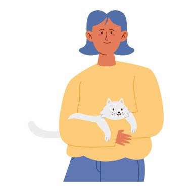 Genç kadın sevimli kedisini nazikçe kucaklıyor.