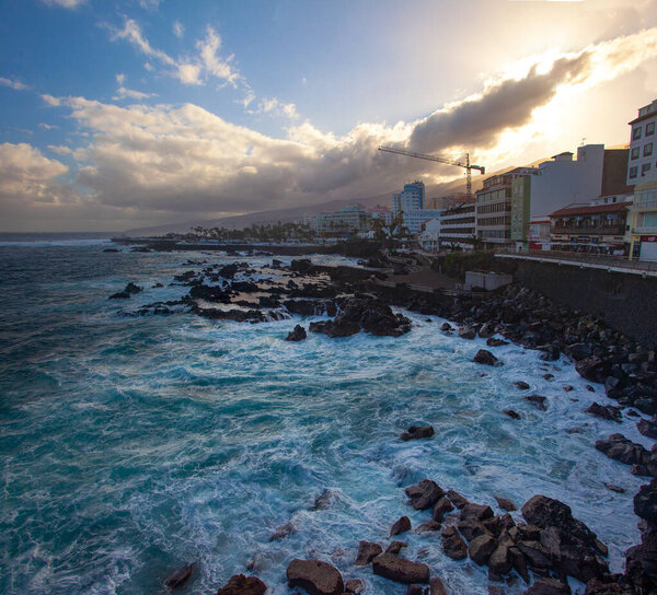 PUERTO DE LA CRUZ, SPAIN - MARCH 1, 2022: Quay of a popular tourist town on the island of Tenerife, Canary Islands.