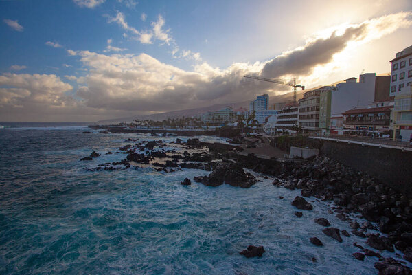 PUERTO DE LA CRUZ, SPAIN - MARCH 1, 2022: Quay of a popular tourist town on the island of Tenerife, Canary Islands.
