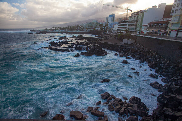 PUERTO DE LA CRUZ, SPAIN - MARCH 1, 2022: Quay of a popular tourist town on the island of Tenerife, Canary Islands.