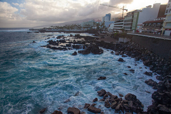 PUERTO DE LA CRUZ, SPAIN - MARCH 1, 2022: Quay of a popular tourist town on the island of Tenerife, Canary Islands.