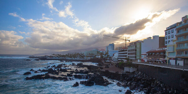 PUERTO DE LA CRUZ, SPAIN - MARCH 1, 2022: Quay of a popular tourist town on the island of Tenerife, Canary Islands.
