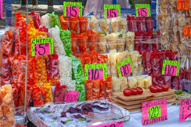 MEXICO CITY, MEXICO. March 24, 2022: Treats stand with batanas, chips, maxican snacks n Chapultepec park, Mexico City, Mexico,