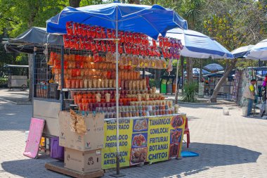 MEXICO CITY, MEXICO. March 24, 2022: Treats stand with batanas, chips, maxican snacks n Chapultepec park, Mexico City, Mexico,