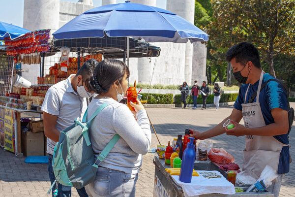 MEXICO CITY, MEXICO. March 24, 2022: Treats stand iwith batanas, chips, maxican snachs n Chapultepec park, Mexico City, Mexico,
