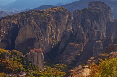 Amazing monasteries of Meteora on the rocks in autumn , Greece. Holy trinity monastery view