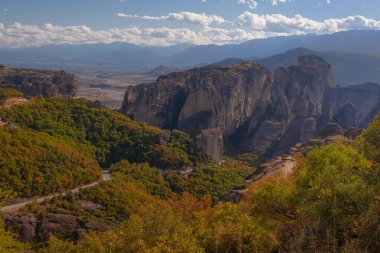 Amazing monasteries of Meteora on the rocks in autumn , Greece. Holy trinity monastery view
