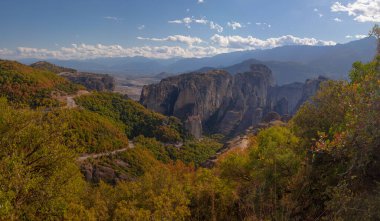 Amazing monasteries of Meteora on the rocks in autumn , Greece. Holy trinity monastery view