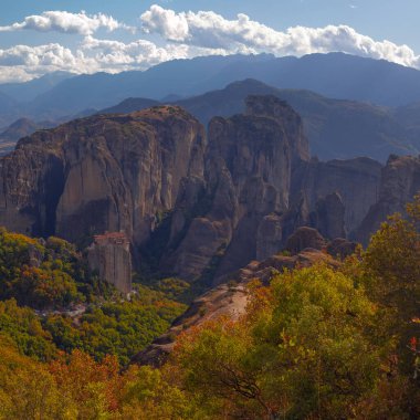 Amazing monasteries of Meteora on the rocks in autumn , Greece. Holy trinity monastery view