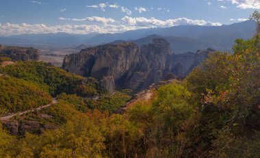Amazing monasteries of Meteora on the rocks in autumn , Greece. Holy trinity monastery view