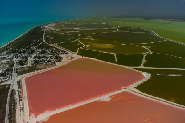 Pink lakes and ocean, nature  in Las Coloradas, Mexico