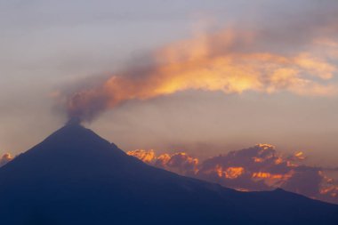 View on th Popocatepetl Volcano during sunset from the ancient pyramid of Cholula, Mexico
