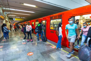 MEXICO CITY, MEXICO - MARCH 14, 2022 - Salto del Agua metro station with rubber-tyred train, Mexico City Metro (STC)