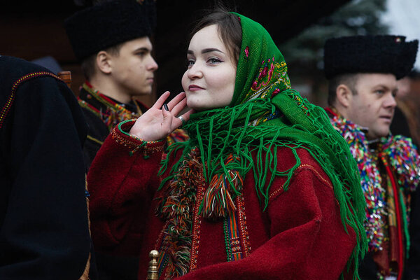 Kryvorivnya, UUkraine - JANUARY 6, 2023: Gutsuls (highlanders in Carpathian mountains) are singing Christmas Carols (Kolyadki)  in Kryvorivnya, Ukraine.