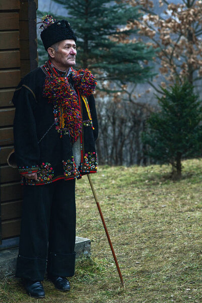 Kryvorivnya, UUkraine - JANUARY 6, 2023: Gutsuls (highlanders in Carpathian mountains) are singing Christmas Carols (Kolyadki)  in Kryvorivnya, Ukraine.