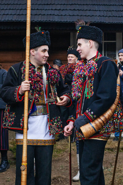 Kryvorivnya, Ukraine - January 6, 2024: Gutsuls (highlanders in Carpathian mountains) are singing Christmas Carols (Kolyadki)  in Kryvorivnya, Ukraine.