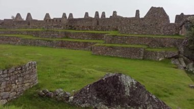 Machu Picchu ancient city view from Huchu'y Picchu in cloudy weather