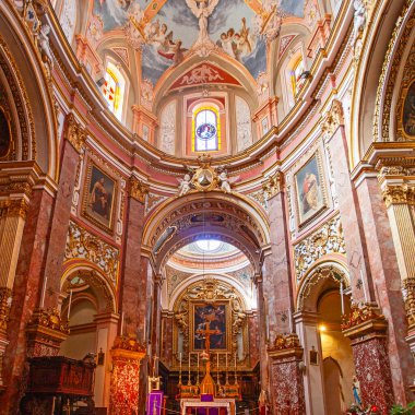 Mdina, Malta, - Februaty 14, 2024 : Beautiful Maltese Baroque interior of Church  of the Annunciation also known as The Carmelite Church is a Baroque church of the Priory of Our Lady of Mount Carmel clipart