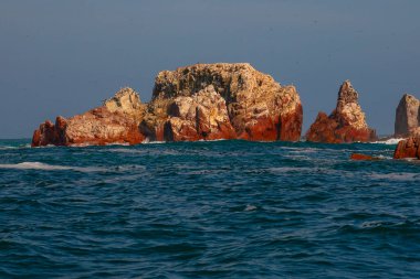 Lots of birds on Ballestas Islands national reserve, Paracas, Peru