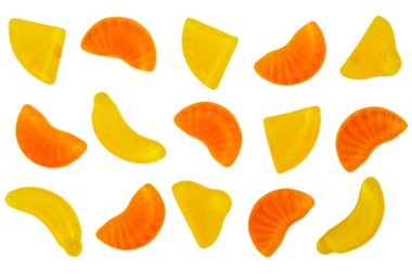 Fresh jelly fruit candies on the white background clipart