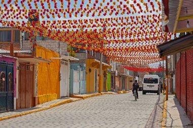 Mexico, - 16 March, 2022: Traditional decorated mexicaln street  in the small town near the famous Teotihuacan pyramids clipart