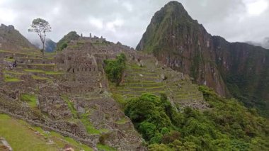 Machu Picchu ancient city view from Huchu'y Picchu in cloudy weather