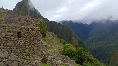 Machu Picchu ancient city view from Huchu'y Picchu in cloudy weather