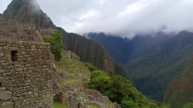 Machu Picchu ancient city view from Huchu'y Picchu in cloudy weather