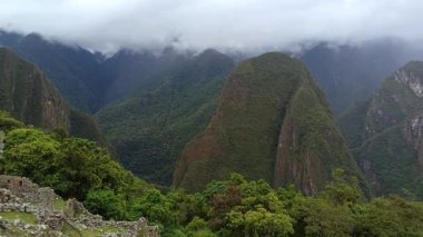Machu Picchu ancient city view from Huchu'y Picchu in cloudy weather