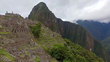 Machu Picchu ancient city view from Huchu'y Picchu in cloudy weather