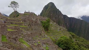 Machu Picchu ancient city view from Huchu'y Picchu in cloudy weather