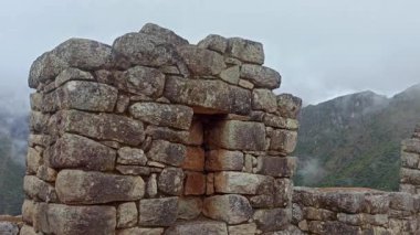 Machu Picchu ancient city view from Huchu'y Picchu in cloudy weather