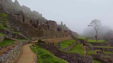 Machu Picchu ancient city view from Huchu'y Picchu in cloudy weather