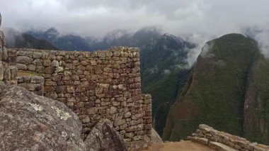 Machu Picchu ancient city view from Huchu'y Picchu in cloudy weather