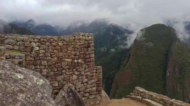 Machu Picchu ancient city view from Huchu'y Picchu in cloudy weather